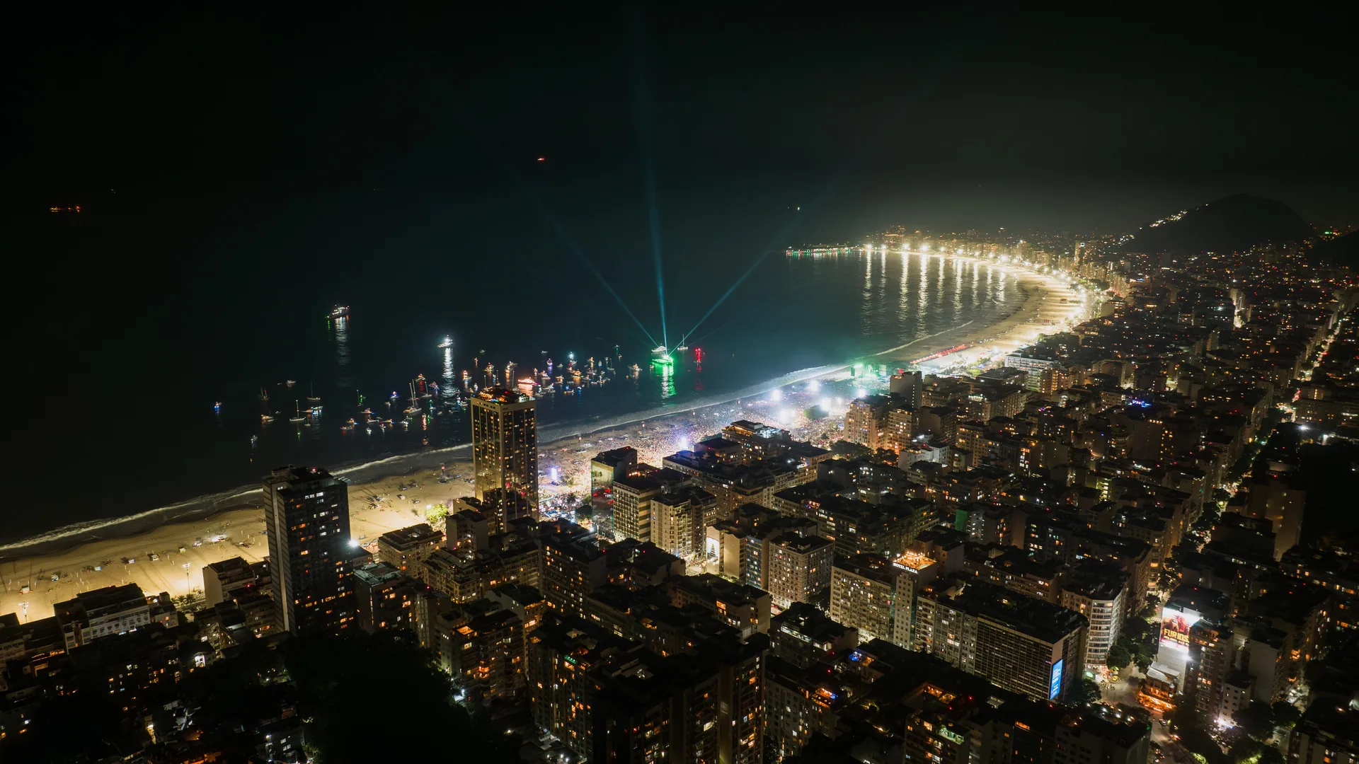 Copacabana at night with the lights of the beachfront curving away